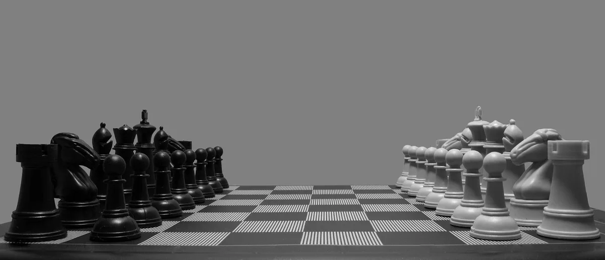 Close-up of a generic coach's tactics board and whistle on a bench, no logos